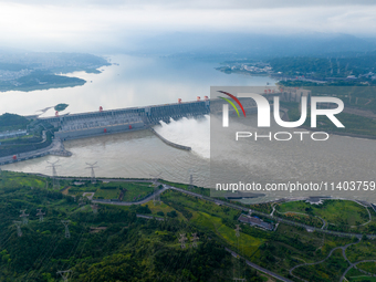 An aerial photo is showing the four holes of the Three Gorges Reservoir discharging flooding water in Yichang, China, on July 12, 2024. (