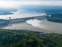 An aerial photo is showing the four holes of the Three Gorges Reservoir discharging flooding water in Yichang, China, on July 12, 2024. (