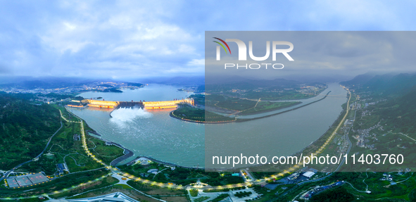 An aerial photo is showing the four holes of the Three Gorges Reservoir discharging flooding water in Yichang, China, on July 12, 2024. 