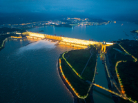 An aerial photo is showing the four holes of the Three Gorges Reservoir discharging flooding water in Yichang, China, on July 12, 2024. (