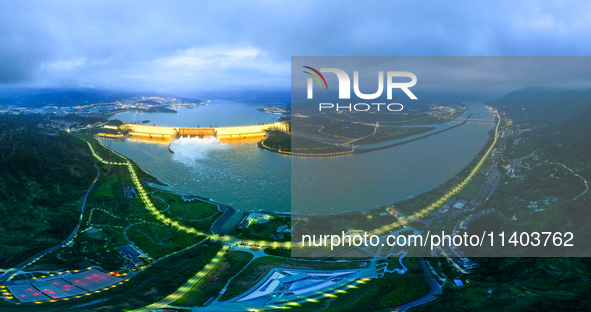 An aerial photo is showing the four holes of the Three Gorges Reservoir discharging flooding water in Yichang, China, on July 12, 2024. 