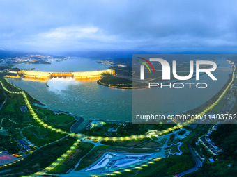 An aerial photo is showing the four holes of the Three Gorges Reservoir discharging flooding water in Yichang, China, on July 12, 2024. (