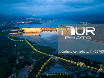 An aerial photo is showing the four holes of the Three Gorges Reservoir discharging flooding water in Yichang, China, on July 12, 2024. (