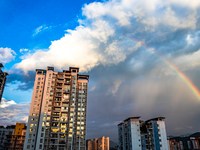 A photo is showing a rainbow over Nanchuan urban area in Chongqing, China, on July 12, 2024. (