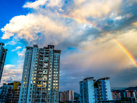 A photo is showing a rainbow over Nanchuan urban area in Chongqing, China, on July 12, 2024. (