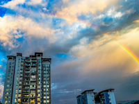 A photo is showing a rainbow over Nanchuan urban area in Chongqing, China, on July 12, 2024. (