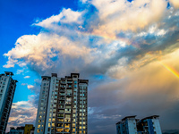 A photo is showing a rainbow over Nanchuan urban area in Chongqing, China, on July 12, 2024. (