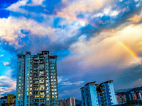 A photo is showing a rainbow over Nanchuan urban area in Chongqing, China, on July 12, 2024. (