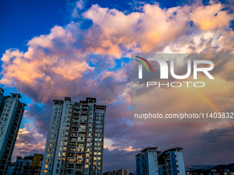 A photo is showing a rainbow over Nanchuan urban area in Chongqing, China, on July 12, 2024. (