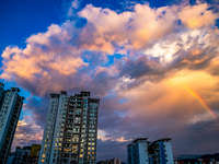 A photo is showing a rainbow over Nanchuan urban area in Chongqing, China, on July 12, 2024. (