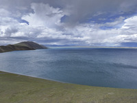 Tourists are enjoying the scenery of Bamucuo Lake in Nagqu, China, on July 12, 2024. (