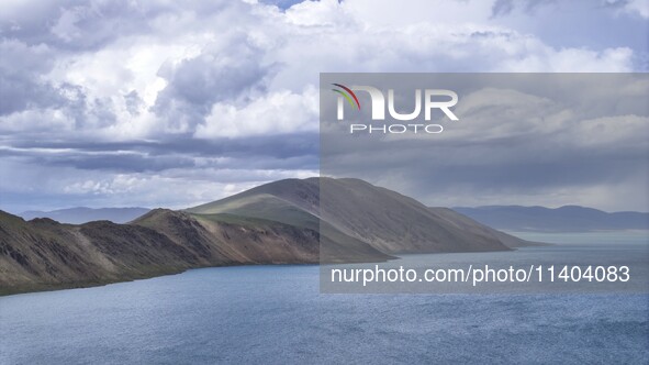 Tourists are enjoying the scenery of Bamucuo Lake in Nagqu, China, on July 12, 2024. 