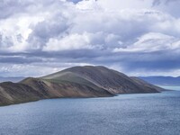 Tourists are enjoying the scenery of Bamucuo Lake in Nagqu, China, on July 12, 2024. (