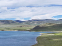 Tourists are enjoying the scenery of Bamucuo Lake in Nagqu, China, on July 12, 2024. (