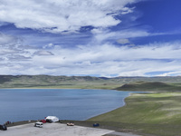 Tourists are enjoying the scenery of Bamucuo Lake in Nagqu, China, on July 12, 2024. (