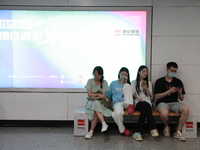 Citizens are cooling off at a subway station in Xi'an, China, on July 12, 2024. (