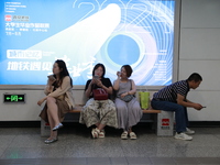 Citizens are cooling off at a subway station in Xi'an, China, on July 12, 2024. (