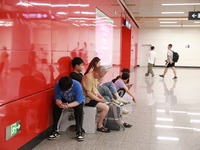 Citizens are cooling off at a subway station in Xi'an, China, on July 12, 2024. (