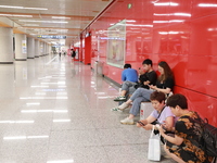 Citizens are cooling off at a subway station in Xi'an, China, on July 12, 2024. (