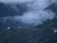 A view of Bosan Hill is being seen from Kirtipur after heavy rainfall in Kirtipur, Nepal, on July 13, 2024. (