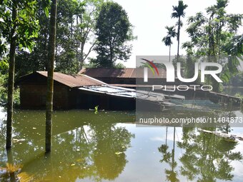 A house is being partially submerged after heavy rains in Nagaon District of Assam, India, on July 13, 2024. (