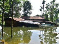 A house is being partially submerged after heavy rains in Nagaon District of Assam, India, on July 13, 2024. (