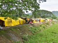 Flood-affected people are taking shelter in a makeshift camp in Nagaon District, Assam, India, on July 13, 2024. (