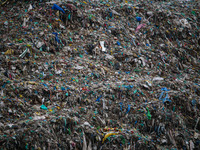 Heaps of garbage are being seen at an open garbage dumping site in Srinagar, Jammu and Kashmir, on July 13, 2024. The improper disposal of w...