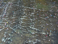 Tourists are enjoying cooling off in the water in Pingnan county, in Fujian, China, on July 13, 2024. (