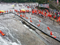 Tourists are enjoying cooling off in the water in Pingnan county, in Fujian, China, on July 13, 2024. (