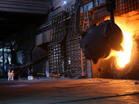 A worker is working at a steel casting workshop of a steel company in Lianyungang, China, on July 13, 2024. (