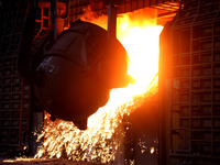 A worker is working at a steel casting workshop of a steel company in Lianyungang, China, on July 13, 2024. (