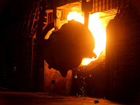 A worker is working at a steel casting workshop of a steel company in Lianyungang, China, on July 13, 2024. (