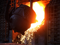 A worker is working at a steel casting workshop of a steel company in Lianyungang, China, on July 13, 2024. (