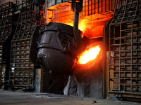 A worker is working at a steel casting workshop of a steel company in Lianyungang, China, on July 13, 2024. (