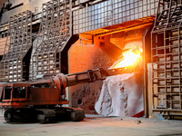 A worker is working at a steel casting workshop of a steel company in Lianyungang, China, on July 13, 2024. (