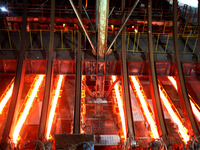 A worker is working at a steel casting workshop of a steel company in Lianyungang, China, on July 13, 2024. (