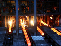 A worker is working at a steel casting workshop of a steel company in Lianyungang, China, on July 13, 2024. (