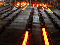 A worker is working at a steel casting workshop of a steel company in Lianyungang, China, on July 13, 2024. (