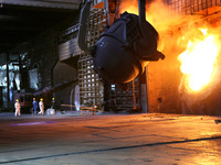 A worker is working at a steel casting workshop of a steel company in Lianyungang, China, on July 13, 2024. (