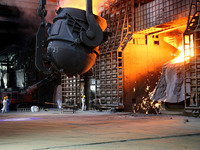 A worker is working at a steel casting workshop of a steel company in Lianyungang, China, on July 13, 2024. (