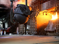 A worker is working at a steel casting workshop of a steel company in Lianyungang, China, on July 13, 2024. (