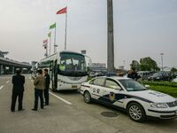 Chinese public security officers are standing by near the airport in Nanjing, China. (