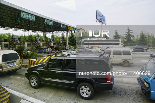 A general view of a highway tollgate is being shown in Nanjing, China. 