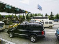 A general view of a highway tollgate is being shown in Nanjing, China. (