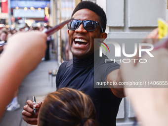 Joshua Boone signing autographs after 'The Outsiders' musical show in Bernard B. Jacobs Theatre on Broadway, New York, United States of Amer...