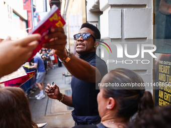 Joshua Boone signing autographs after 'The Outsiders' musical show in Bernard B. Jacobs Theatre on Broadway, New York, United States of Amer...