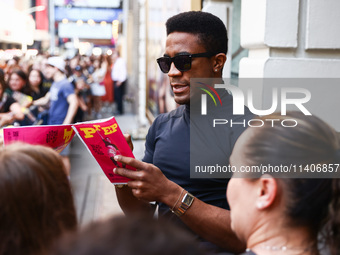 Joshua Boone signing autographs after 'The Outsiders' musical show in Bernard B. Jacobs Theatre on Broadway, New York, United States of Amer...