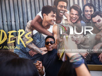 Joshua Boone signing autographs after 'The Outsiders' musical show in Bernard B. Jacobs Theatre on Broadway, New York, United States of Amer...