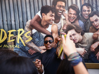 Joshua Boone signing autographs after 'The Outsiders' musical show in Bernard B. Jacobs Theatre on Broadway, New York, United States of Amer...